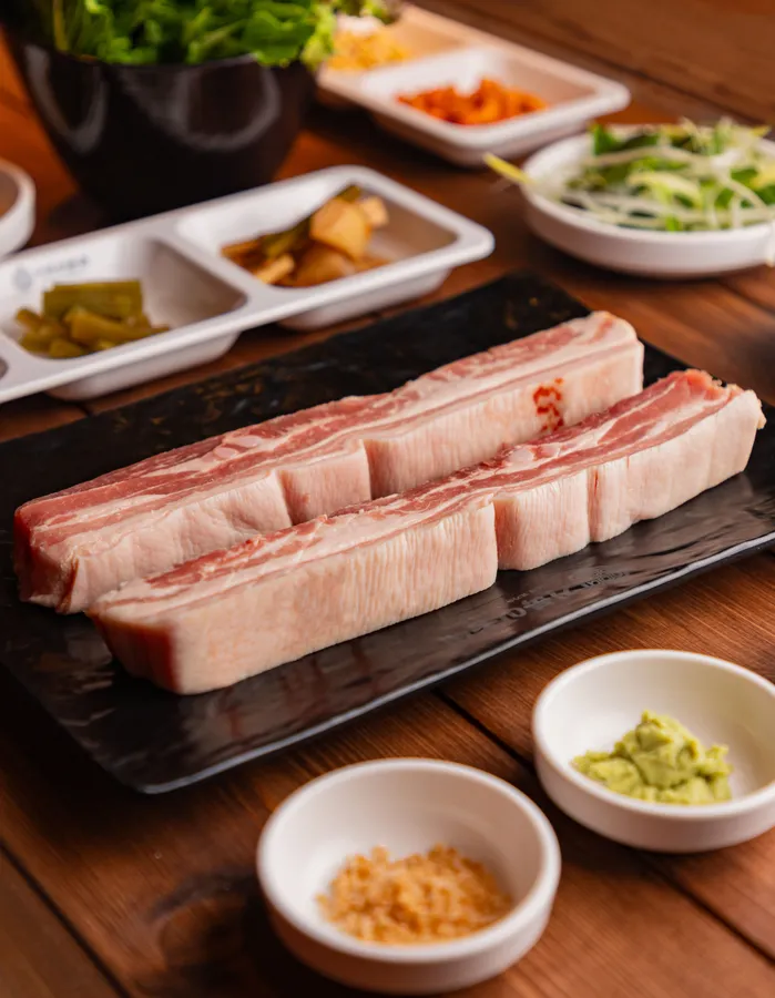 숙성 오겹살 100g 공식 메뉴 이미지
